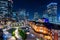 Tokyo railway station and business district building at night, Japan