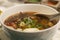 Tokyo ramen noodles with peppery Harissa beef ribs in chicken broth