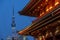 Tokyo sky tree against with traditional style roof of Sensoji temple.