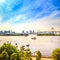 Tokyo sunset Skyline with Rainbow Bridge and bay from Odaiba. Japan