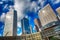 Tokyo urban cityscape, with high-rise office buildings. Blue sky and cloud background and HDR processing