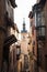 Toledo, Castilla-La Mancha, Spain. Old medieval town, narrow street, church