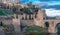 Toledo cityscape panorama, Alcantara bridge over the Tagus Tajo river, Gate and the city walls.