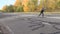 Tolyatti Samara region Russia-October 04 2020: city Park. An elderly man rides roller skates.