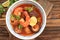Tom Yam Kung, Prawn and Lemon Red Soup with Squid and Mushrooms