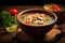 Tom Yam Kung, Prawn and lemon soup with mushrooms, Thai food in wooden bowl