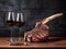 Tomahawk Steak on wooden table with two glasses of red wine in front of dark grey stone wall. Tomahawk ribeye grilled steak on the