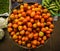 Tomato in a basket sold in traditional market photo taken in pasar minggu jakarta