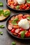 Tomato Burrata salad with herbs and basil. Healthy food