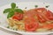 Tomato and colored spaghetti