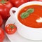 Tomato cream soup with tomatoes in bowl healthy eating