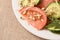 Tomato and cucumber. Light background. Sprouted beans