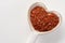 Tomato Flakes on a Heart Shaped Spoon