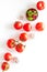 Tomato frame with suase and garlic on white background top-down