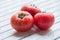 Tomato fruits on wooden table