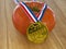 Tomato with a gold medal
