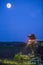 Tomato harvester working at night under moonlight