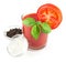 Tomato juice with basil leaves, tomato slice and bowls with black pepper and sea salt
