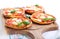 Tomato and mozzarella mini pizzas
