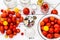 Tomato prepared for preservation on a white wooden background