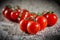 Tomato in a random arrangement on wood with rustic patina