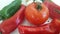 Tomato red pepper, garlic on white background preparation black pepper drops