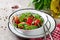 Tomato salad with basil and pine nuts in bowl - healthy vegetarian vegan diet organic food appetizer