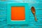 Tomato sauce on square turquoise dish