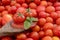 Tomato sauce on wooden spoon with cherry tomatoes and basil on background with tomatoes. Isolated photo Italian cuisine pasta