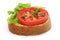 Tomato and a slice of whole wheat bread