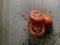 Tomato sliced on rustic background in studio, Food Photography