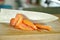 tomato slicing by knife on chop block