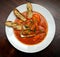 Tomato soup with seafood and toasts