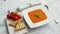 Tomato soup served with crisp bread