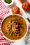 Tomato soup with smoked sausage and lentils