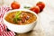 Tomato soup with smoked sausage and lentils