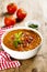 Tomato soup with smoked sausage and lentils