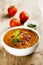 Tomato soup with smoked sausage and lentils