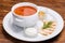 Tomato soup in a white bowl