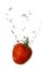 Tomato in water with air bubbles