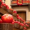 Tomatoes in baskets arranged on a wooden balcony against the backdrop of La Tomatina Festival.Generative AI