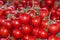 Tomatoes on bench in public market