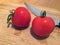 Tomatoes on a chopping board landscape with knife