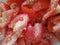 Tomatoes cut into slices and salted with coarse salt