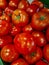 Tomatoes displayed for sale at the supermarket