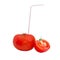 Tomatoes with drinking straw on a light background