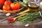 Tomatoes, eggplant, olive oil and bunch of rosemary