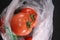 Tomatoes at the grocery store,inside plastic bag billboard