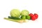 Tomatoes, lemons, cabbage, scallions, lemongrass on a white background. Focus on lemongrass.