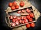 Tomatoes with old hatchet on the tray.